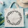 A digital wreath template in SVG format, ideal for use with design software such as Illustrator, Procreate, or Photoshop.