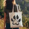 Illustrative paw print design featuring individual animal footprints.