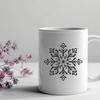 A delicate, intricately designed winter snowflake with symmetrical patterns.