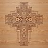 Ornate cross design made from vector shapes, suitable for various applications including religious art.