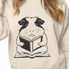Cute Guinea Pig Reading Aloud A vector illustration of a guinea pig reading a book in a comfortable setting.