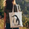 A single-colored graphic representation of a penguin bird.