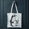 Penguin Reading on Ice A black and white illustration of a penguin sitting on ice, holding a book in its flippers.