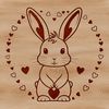 Cute Cartoon Bunny with Heart Surrounds A cute cartoon rabbit sitting on its hind legs with love hearts surrounding it.