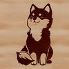 A cute Japanese Shiba Inu breed dog sitting on its haunches.