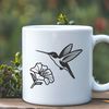 Whimsical Hummingbird Clip Art Design A detailed illustration of a hummingbird surrounded by floral elements.