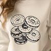 Beautiful Donut Graphic Template A stylized vector design of a lone donut with rounded edges and textured surface.