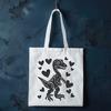 A prehistoric dino illustration featuring love hearts in the design.