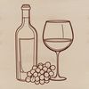 A glass containing red wine with a bottle in the background.