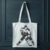 A detailed illustration of a hockey player in action, suitable for vector art and graphic design.