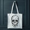 Free Goth-inspired Skull Art A gothic-inspired dripping skull illustration in vector format.