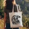 Feathered Bird Silhouette Design A detailed illustration of an eagle's head with intricate feathers and sharp talons.
