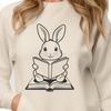 Cute Rabbit Reading Book Illustration A seated rabbit character reading a book with a thoughtful expression.