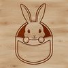 Whimsical Rabbit in a Pocket A rabbit's head peeking out from a pocket, created as a vector design.