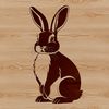 A simple line-art illustration of a rabbit sitting on its haunches.