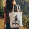 Education Symbol SVG Image A digital illustration of an open book with the Apple logo, suitable for educational resources.