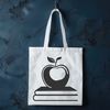 Elegant Education Emblem Vector art of a book with an Apple logo, suitable for use in graphic design projects requiring SVG or clipart files.
