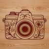 Ornate Floral Camera Design Vector illustration of a stylized camera with ornate floral details, suitable for photography and technology designs.
