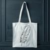 Free Scalable Feather Graphic Design Asset A single feather rendered as a scalable vector graphic.