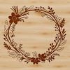 A decorative floral wreath design in vector format.