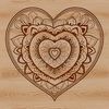 A colorful digital mandala heart design created as a scalable vector graphic (SVG) for various applications.