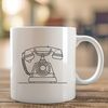 An illustration of a modern telephone with clean lines and minimalist design.