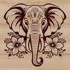An elephant's head with intricate floral details on its ears.