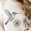 Nectar-Thirsty Hummingbird Design A colorful hummingbird with long beak sipping nectar from a flower.