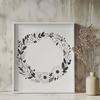 Vector Wreath Artwork A floral wreath design made up of intricate lines and curves in vector format.