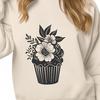 Beautiful Cake Clip Art A stylized illustration of a single serving cupcake with a floral design on top.
