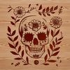 Intricate Floral Skull Design A skull design with intricate thorns surrounding it, suitable for Halloween decorations or tattoo inspiration.