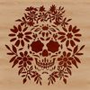 Illustrated skull design with a floral pattern, suitable for tattoo art and vector graphics.