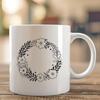 Elegant Floral Wreath Design A floral design in vector format, ideal for cutting machine projects such as Cricut designs or laser cutter templates.
