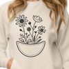Intricate Floral Pocket Design A detailed floral design featuring a pocket shape with intricate illustrations of wild flowers.