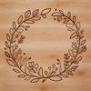 A circular floral arrangement with intertwined elements in a vector format.