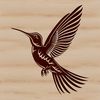 Free Flying Bird Clip Art A colorful hummingbird in flight, perched on a bright flower.