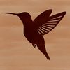 A detailed silhouette of a hummingbird in flight, created as a vector design.