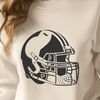Free Football Helmet Graphics A detailed illustration of a football helmet and pigskin in the style of vector graphics.