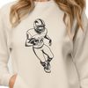 American Football Player Silhouette Illustrated image of a football player wearing a helmet and protective gear, representing the sport of American football.