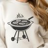 BBQ Grill Vector Art A graphic illustration of a BBQ grill with sizzling food, suitable for vector design and cutting machine projects.