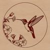 Whimsical Floral Hummingbird Clipart An intricate vector design featuring a detailed hummingbird surrounded by foliage.