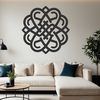 A decorative Celtic-inspired design featuring intricate patterns and shapes.