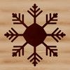 A delicate six-pointed snowflake with intricate design and symmetrical patterns.
