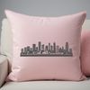 A stylized illustration of a city skyline with skyscrapers and buildings in the background.