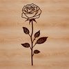 Stylized Rose Clip Art A stylized illustration of a rose, ideal for gardening projects and tattoo designs.