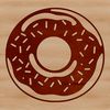 A circular food item with a ring-shaped hole in the center, perfect for decorating or cutting out using a Cricut machine.