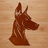 Close-up Doberman Head Silhouette A close-up view of a Doberman Pinscher's head, featuring a sleek coat and distinctive facial features.