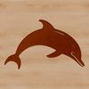 A sleek dolphin swims in the ocean with a school of fish.