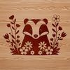 Illustration of a badger in a garden setting surrounded by wildflowers.