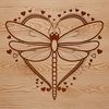 Dragonfly Wings with Loving Touch A colorful illustration of a dragonfly with hearts on its wings.